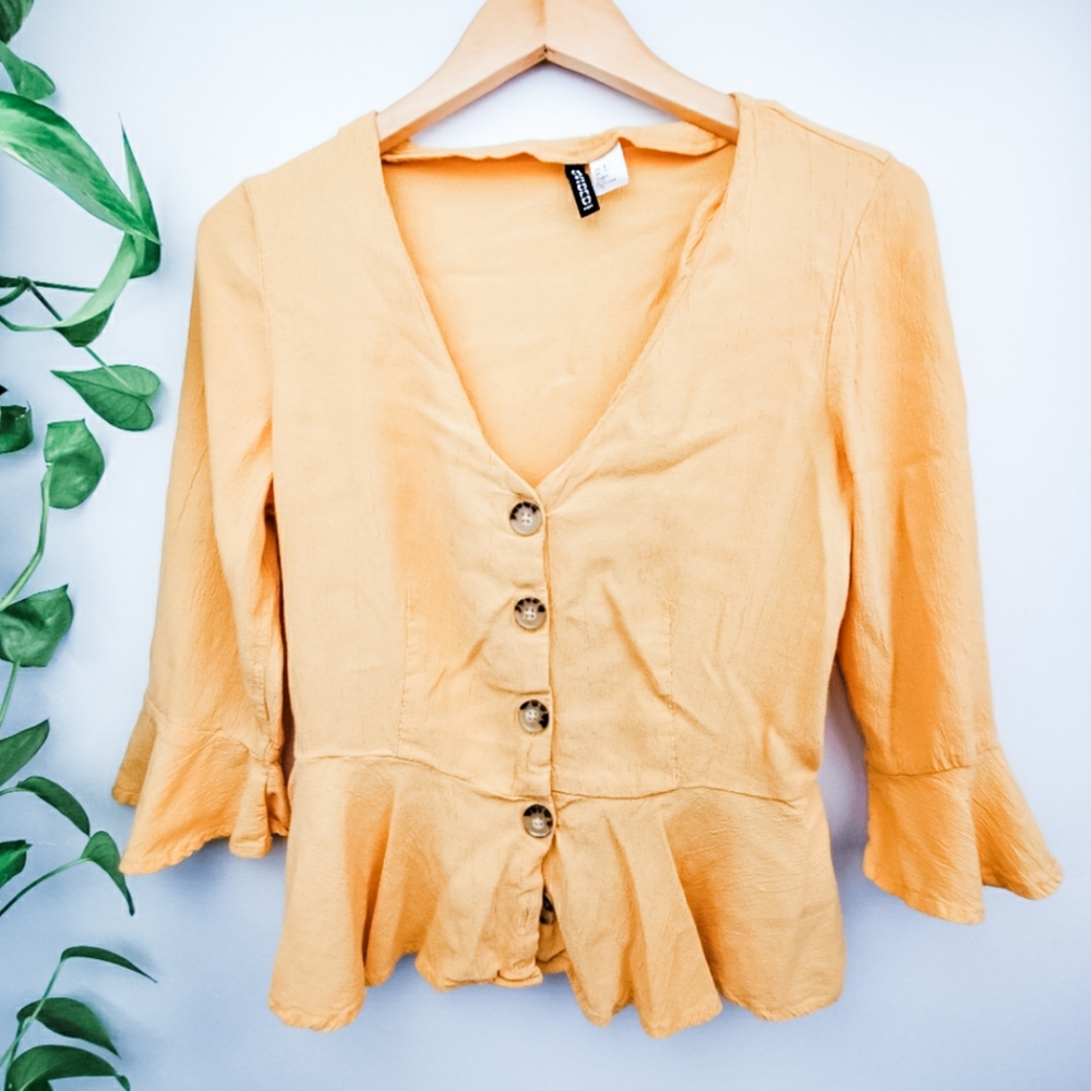 Yellow shirt w/brown button shirt